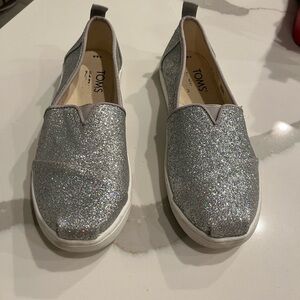 Girls Tom’s sliver glitter shoes